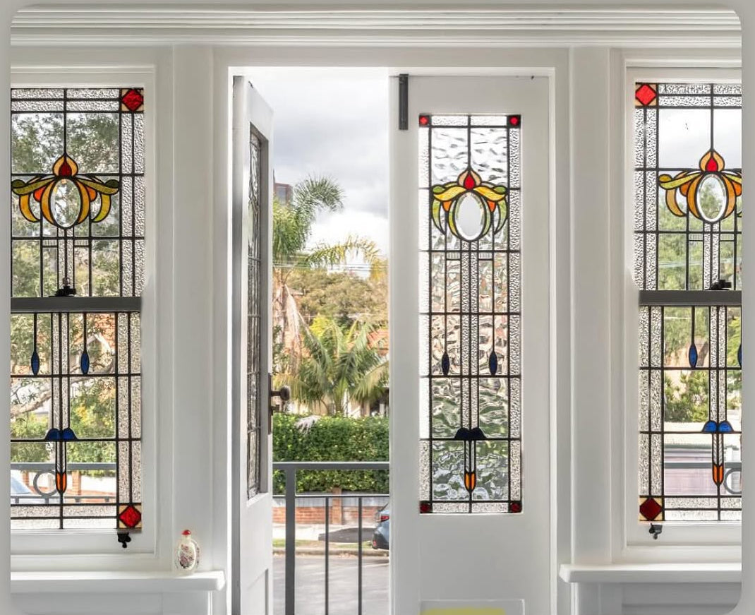 a beautifully restored sash window and door